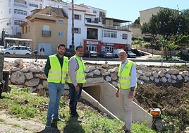The mayor (R) and his councillors visit the site of the new walkway.