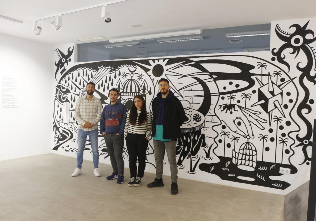 The four young artists who created the mural at the Alianza Francesa.