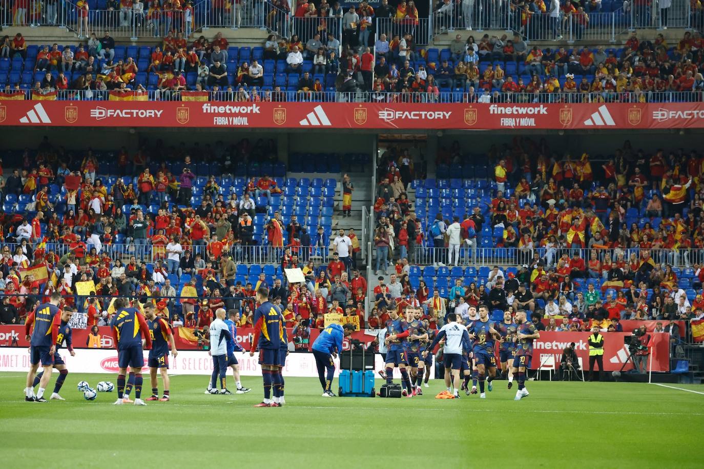 Electric atmosphere in Malaga as Spain's national football team take on Norway, in pictures
