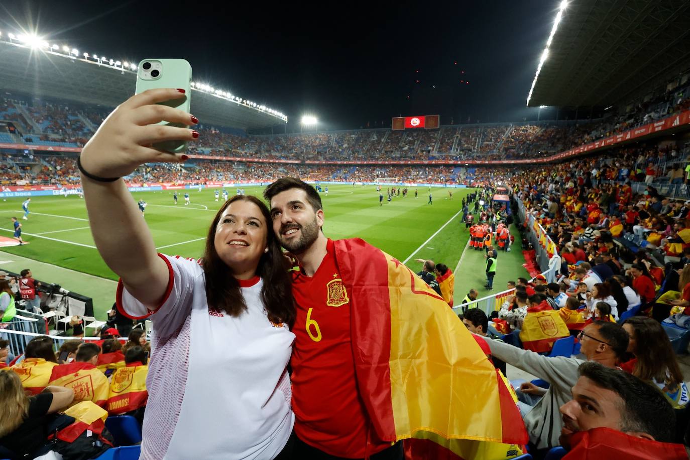 Electric atmosphere in Malaga as Spain's national football team take on Norway, in pictures