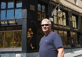 Russian-born musician and entrepreneur Yuri Chugúyev poses in front of the premises.