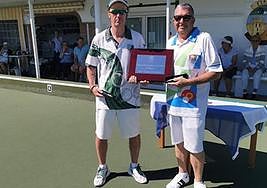 The winner Kevin Westwall holding the trophy.
