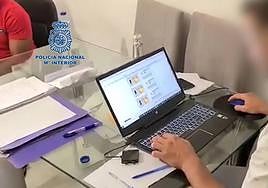 National Police officers during the investigation in Malaga.