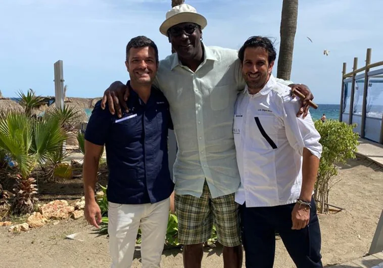 Jordan, with staff from the La Milla Marbella beach bar.