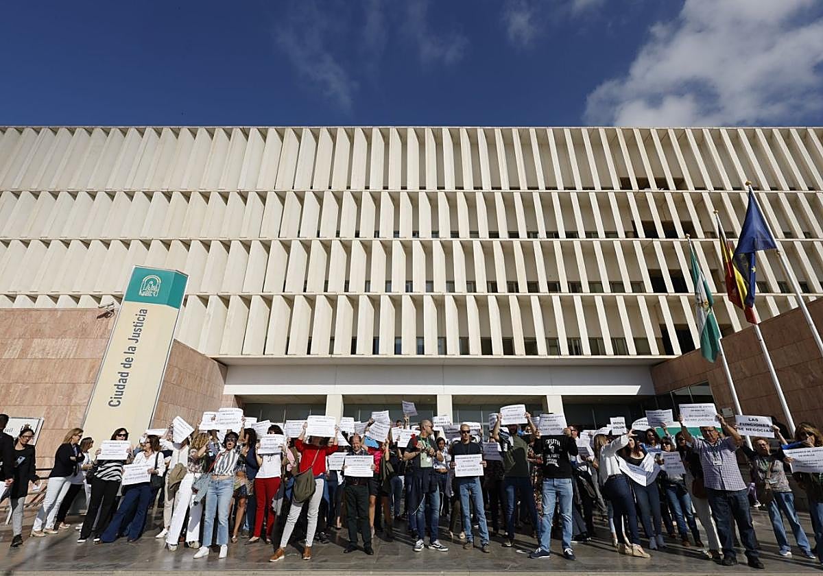 Striking staff protest outside Malaga city's main court building on Wednesday this week.
