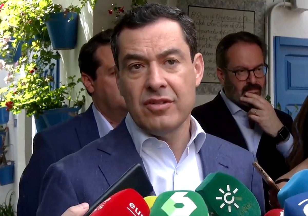 President of the Junta de Andalucía Juanma Moreno talks to reporters in Cordoba.