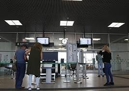 Passengers at the security checkpoint at Antequera AV train station.