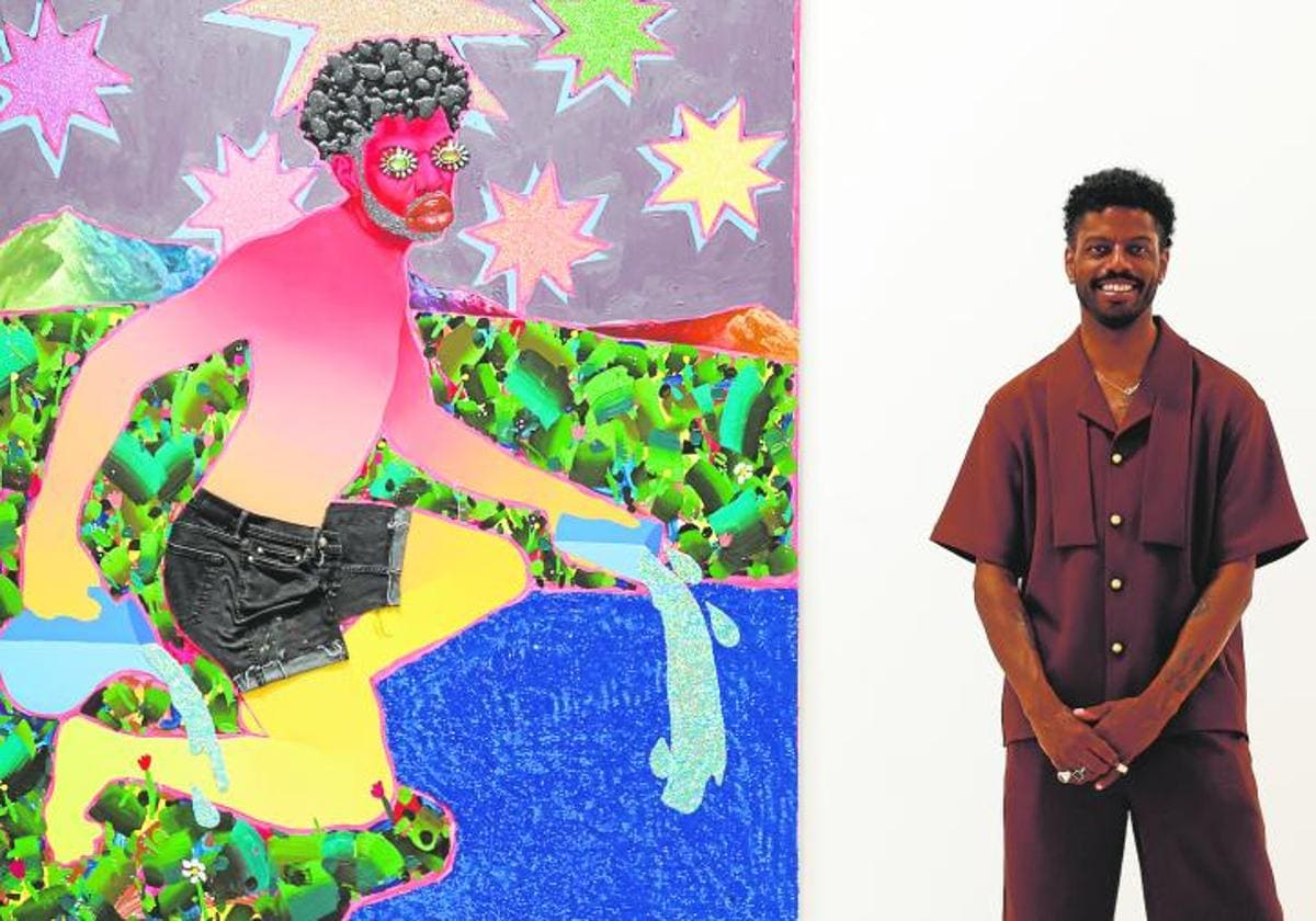 Devan Shimoyana in front of his painting, The Star