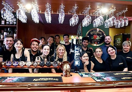 John Scott's workers moments before the opening.