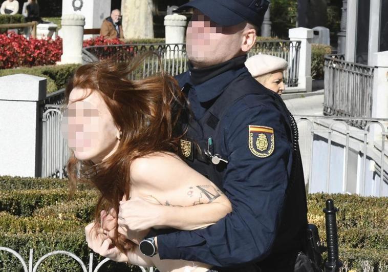 Policeman accused of squeezing Femen activist's breasts during Madrid rally is cleared