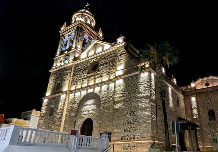 Costa Tropical church lights up night sky