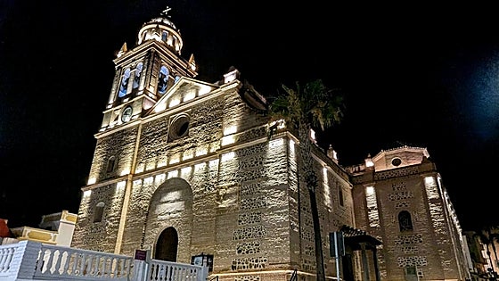 Costa Tropical church lights up night sky