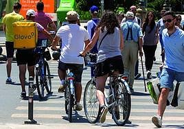 You must get off your bike to cross a pedestrian crossing.