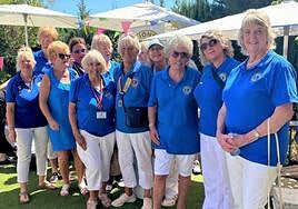 President Wynson Beswick (C) on parade with the Lions last month.