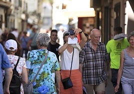 Tourists stroll through the streets of the city of Cadiz, one of the 100 most important destinations in Spain.