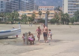 Showers on Malapesquera beach, Benalmádena.