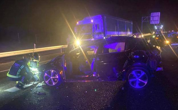 Photograph of an unmarked police car after being rammed in a road pursuit.
