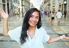 Nesh poses in Calle Larios in Malaga city centre.