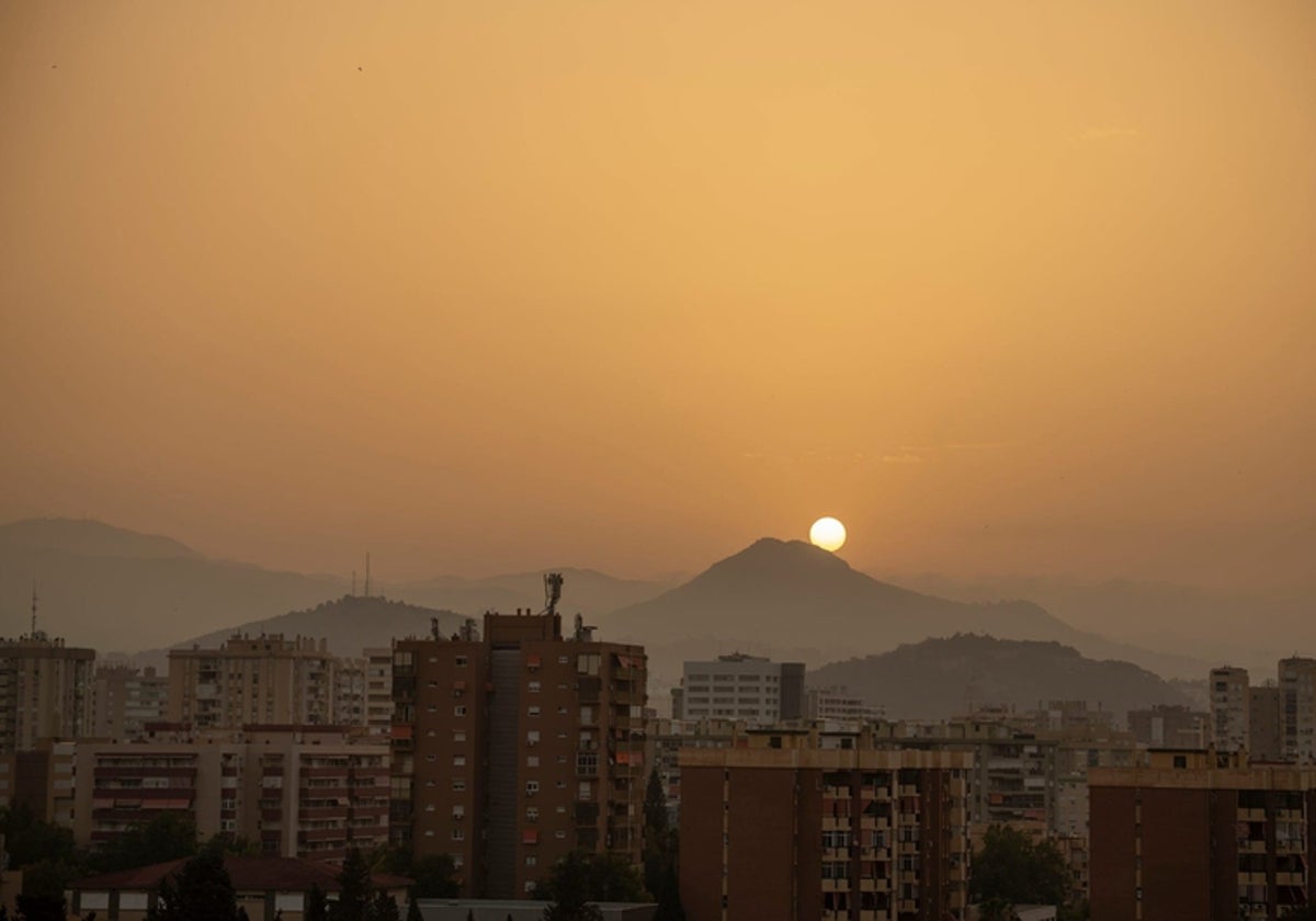 Sunrise this morning, 11 July, was marked by a 'calima' haze covering the skies over Malaga city.