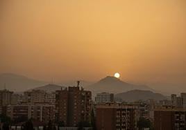 Sunrise this morning, 11 July, was marked by a 'calima' haze covering the skies over Malaga city.
