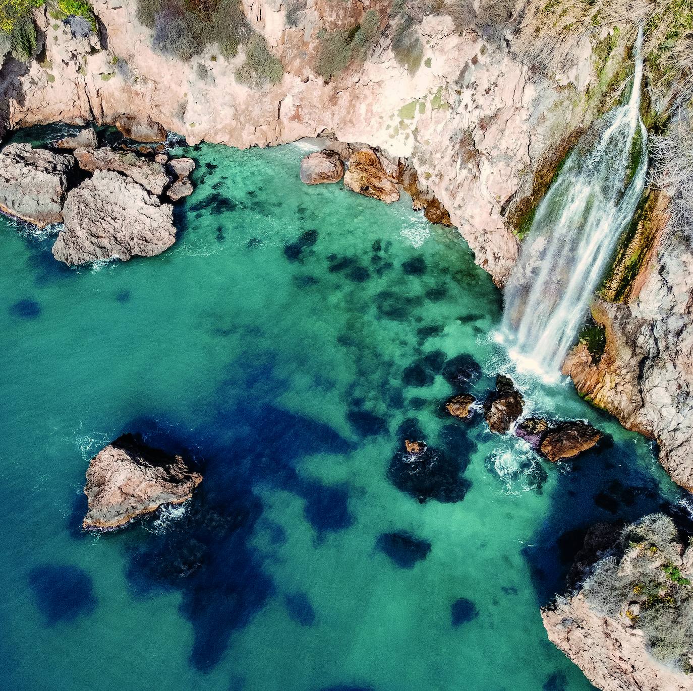 The waterfall at Maro plunges 15 metres into the sea.