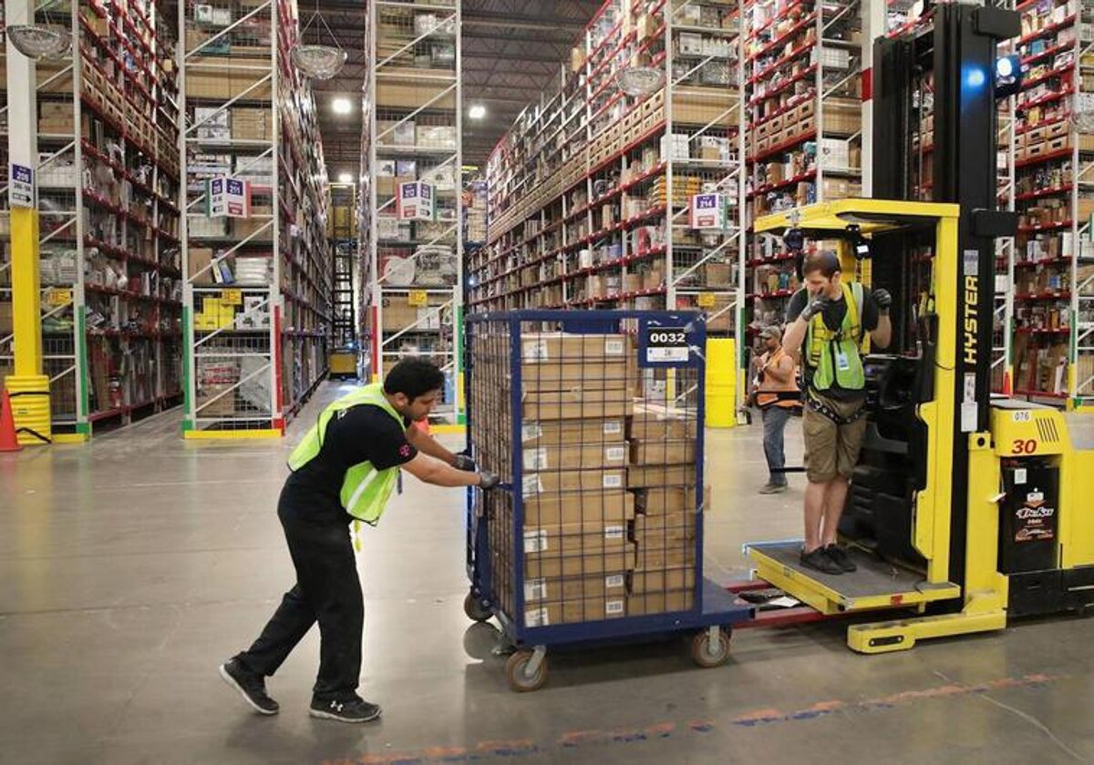 Workers at an Amazon warehouse.