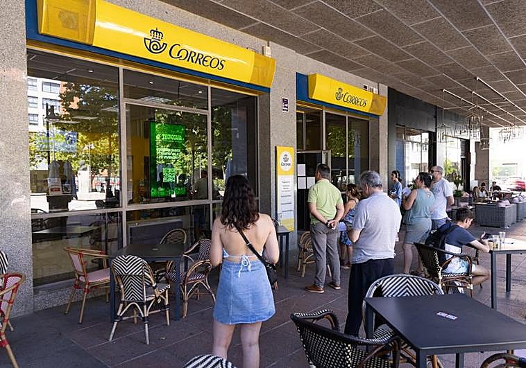The wait outside a post office to collect ballot papers or post a vote.