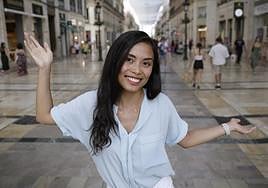 Social media star. Nesh poses in Calle Larios in Malaga city centre.