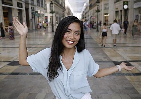 Social media star. Nesh poses in Calle Larios in Malaga city centre.