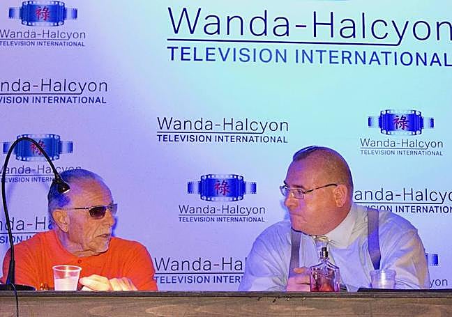 Biker George Christie with Pat Andrew at a press conference announcing a Wanda-Halcyon project.