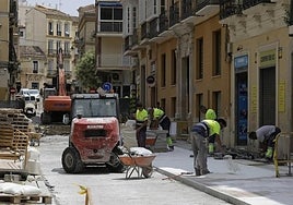 Workers in Malaga this summer.