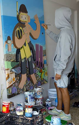 Imon Boy has transformed the sitting room of his flat into an artist's studio.