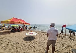 Moisés Jiménez, coordinator of the drone service, flies one of the drones on the beach in Fuengirola