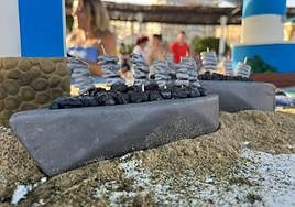 The giant Torre del Mar cake was cut during the town's tourist day.