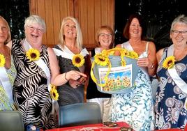 A group of foreign-resident volunteers at a fundraising event in spring this year.