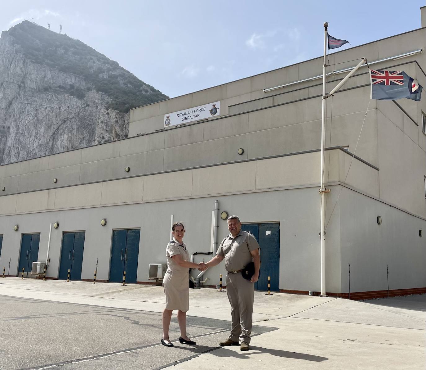 Wing Commander Nel Doherty hands over to Wing Commander Tom Harvey.