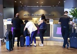 Guests checking in at a Malaga hotel earlier this month.