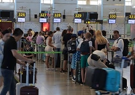 Queues at the check-in desks at Malaga Airport.