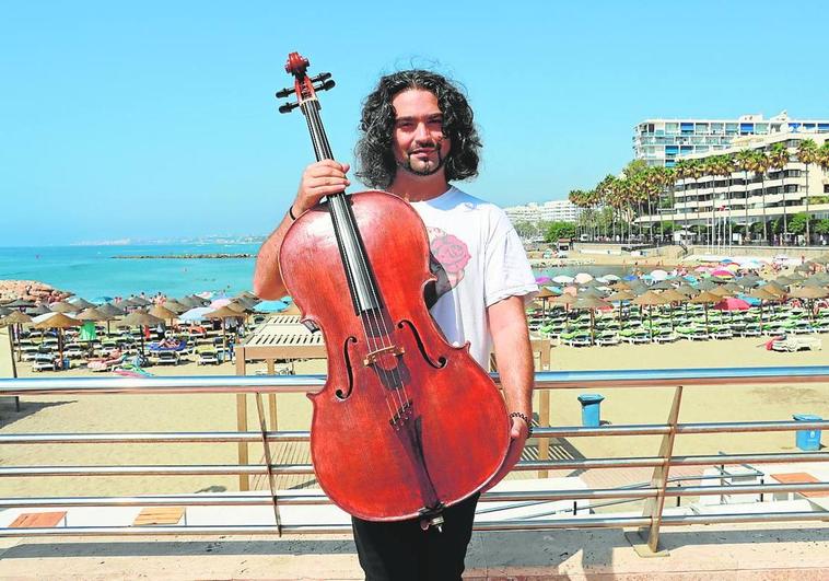 Tin Fernández with his first cello he is restoring.
