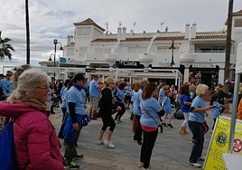 Participants warm up before a previous walk for diabetes.