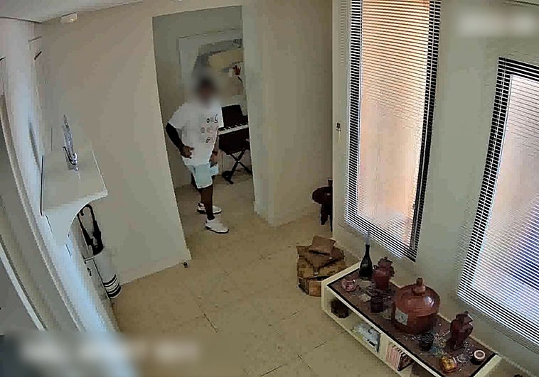 One of the robberies in progress.