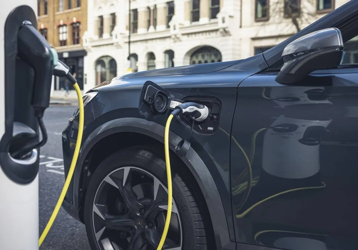 Charging an electric vehicle on the street.