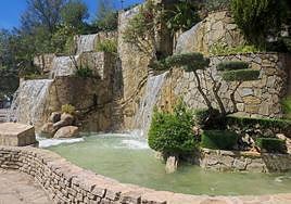 This artificial waterfall at the entrance to the village is a reminder of the importance of water for this area.