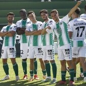 The Antequera players celebrate in front of their fans.