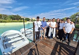 Margarita del Cid with workers from the employment centre.