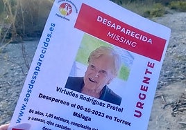 Image of a poster with the details of the missing woman from Torrox.