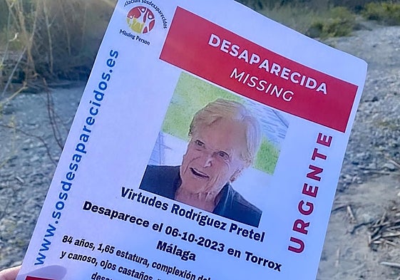 Image of a poster with the details of the missing woman from Torrox.