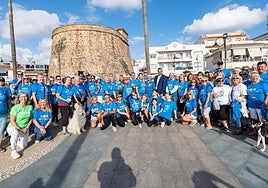 Some of the walkers and Lions members in Plaza del Torreón during last year's event.