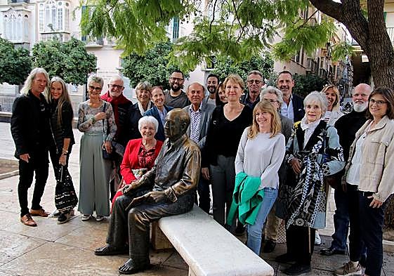 Costa Press Club members and guests gather around a sculpture of Picasso, before a private guided visit around his birthplace museum.