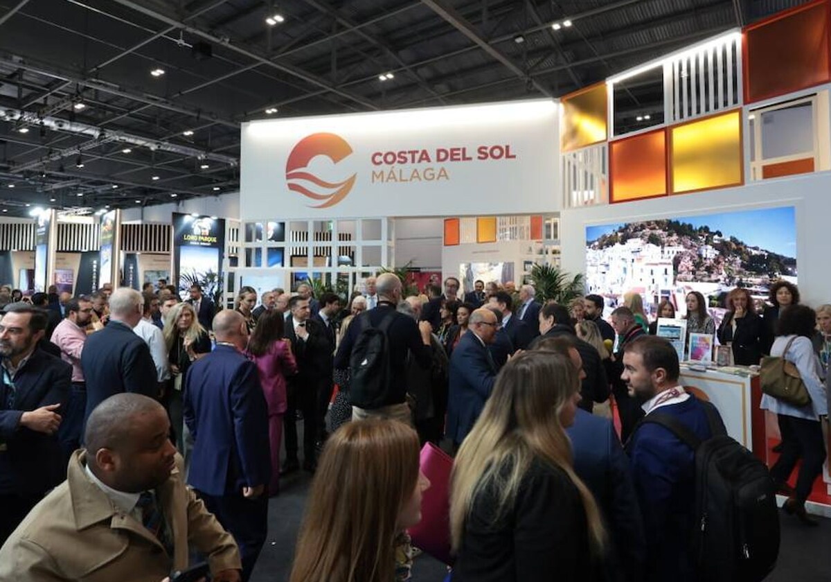 People swarm to the Costa del Sol stand at the World Travel Market in London.
